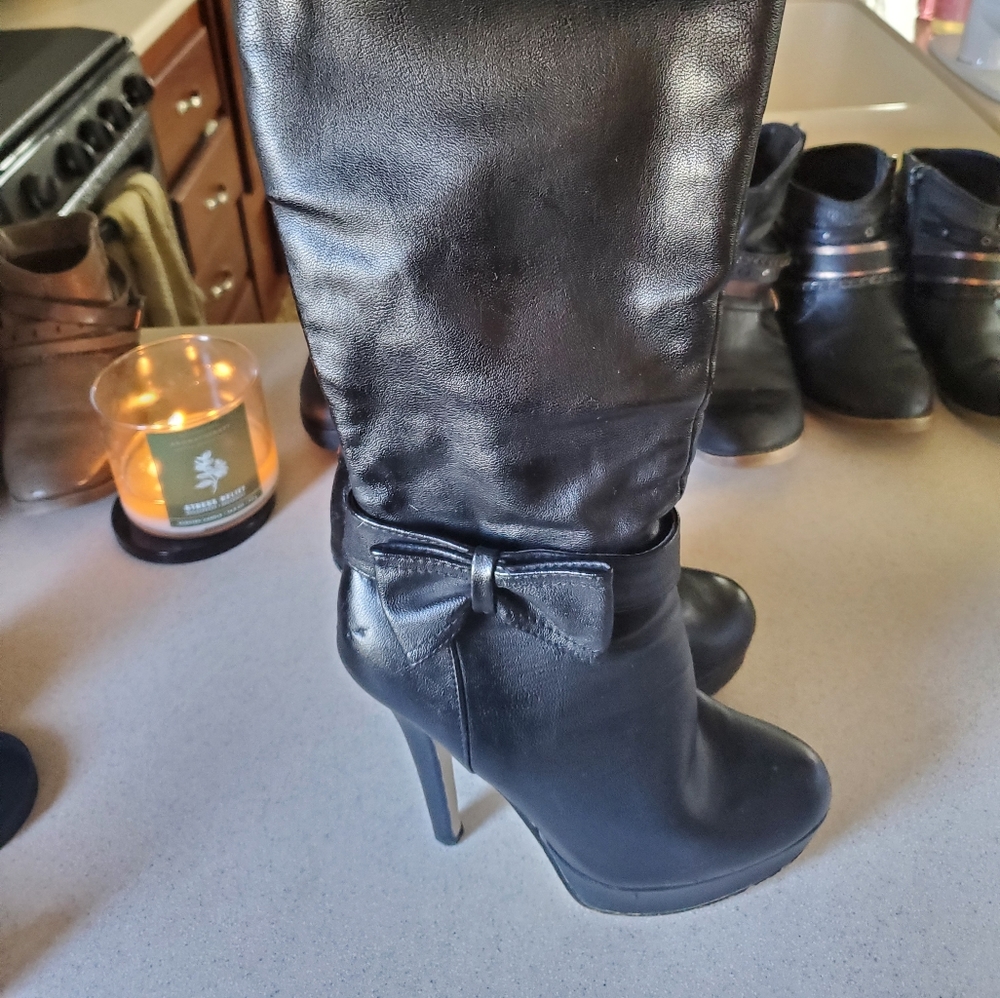 Knee high stiletto boots